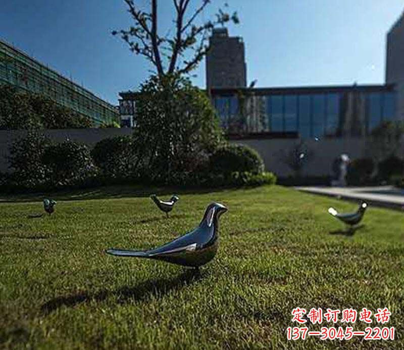 聊城不锈钢镜面鸽子雕塑象征和平与美丽
