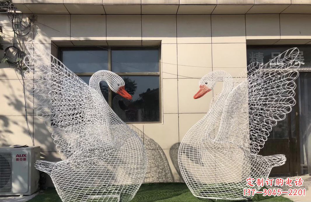 聊城不锈钢镂空天鹅雕塑象征着美丽的永恒