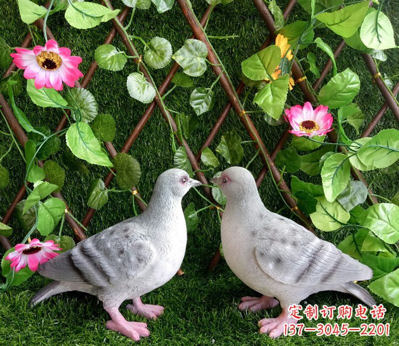 聊城雕塑小女孩一只手拿书一手和平鸽