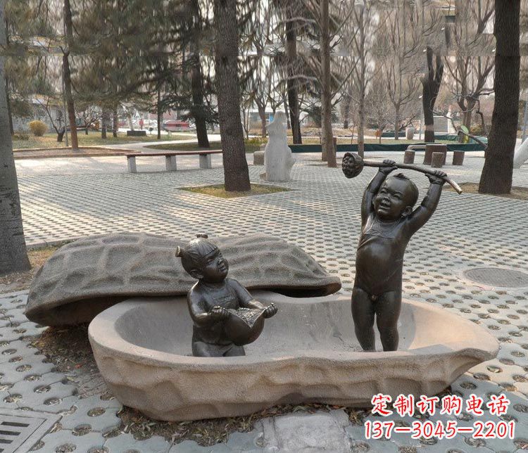 聊城拿莲蓬和石榴的小孩铜雕