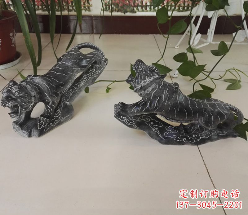 聊城青石大型老虎雕塑是由中领雕塑设计制作的一…