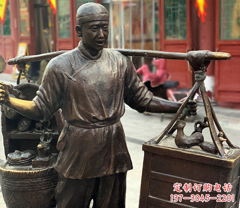 聊城铜雕步行街卖货郎人物雕塑