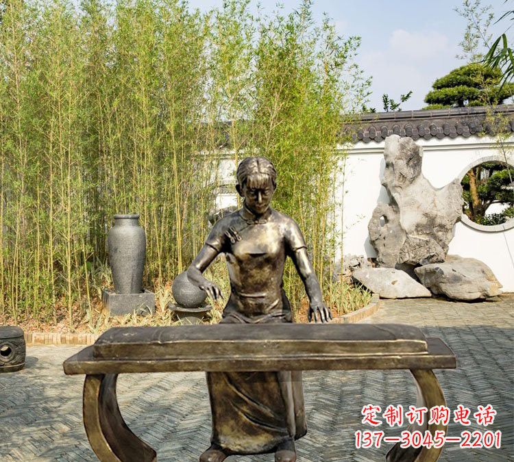聊城铜雕弹古筝人物