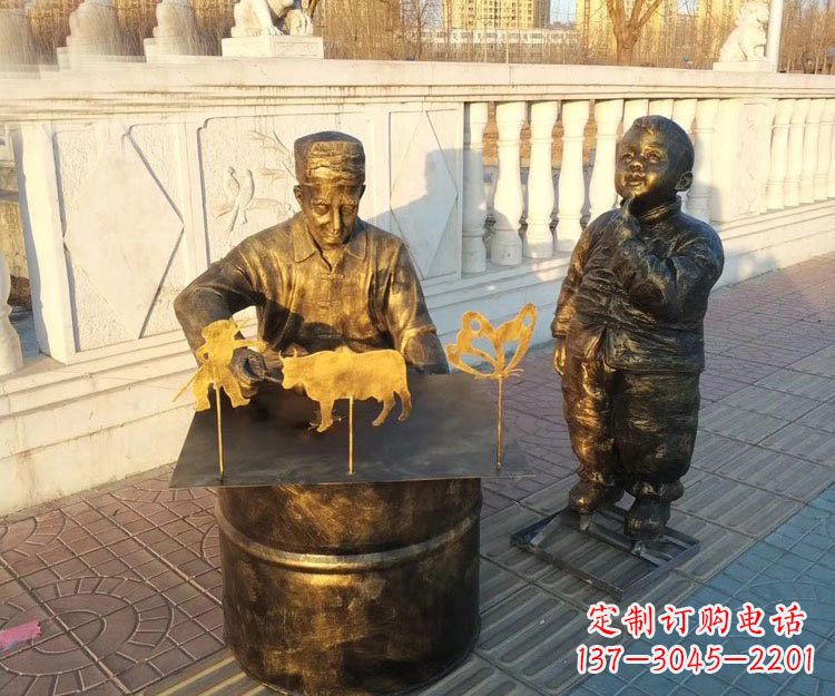 聊城铜雕画糖人的人物