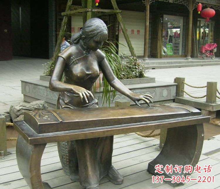 聊城铜雕现代人物弹古筝雕塑