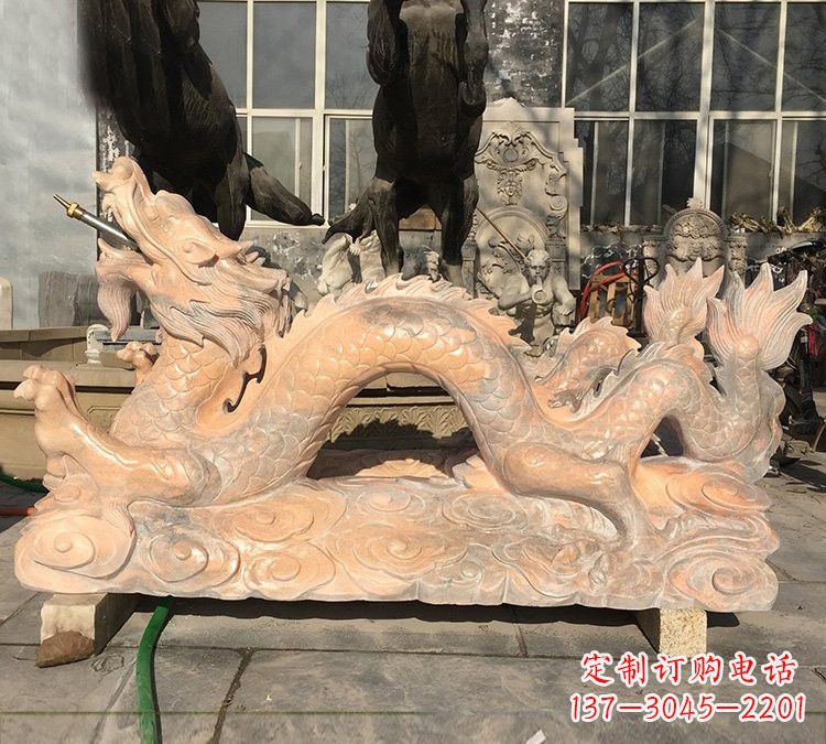 聊城晚霞红石雕喷水龙