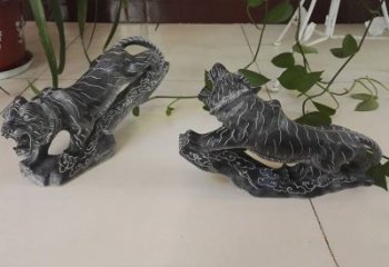 聊城青石大型老虎雕塑是由中领雕塑设计制作的一…