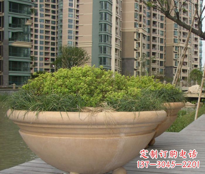 聊城小区景观晚霞红花盆石雕
