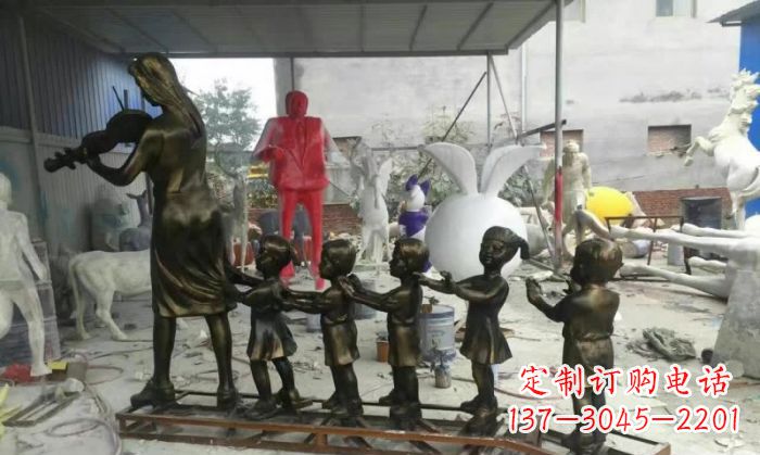 聊城校园老师和儿童铜雕